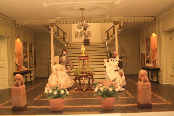 a miniature living room of Lagniappe exhibit in Mini Time Machine museum of miniatures