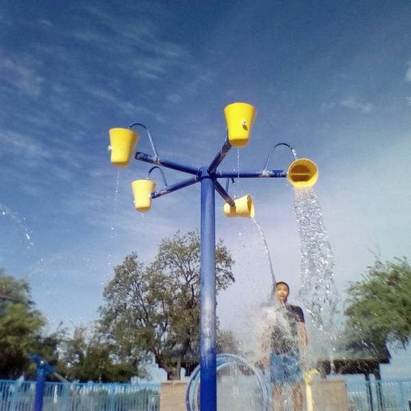 getting wet at Brandi Fenton splash pad