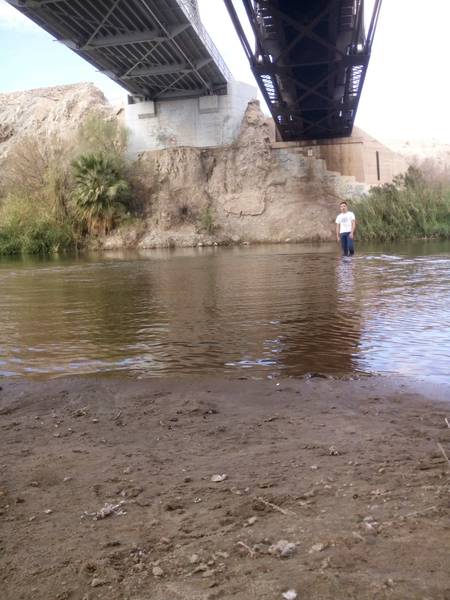 wading in Colorado River at Gateway Park