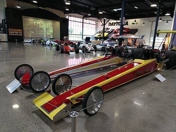 some race cars in World of Speed motorsports museum