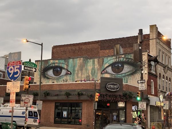 a pair of eyes atop Spread Bagelry